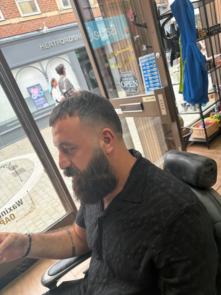 Classic short haircut and beard service at The Antique Barbers.